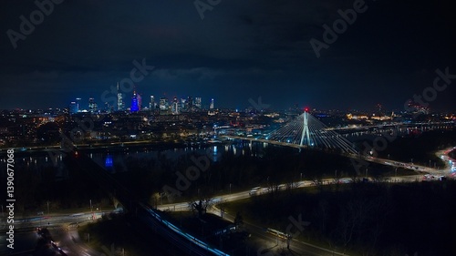 Aerial view of Warsaw after dark, Świętokrzyski Bridge, and a vibrant cityscape.