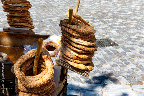 Fototapeta Naklejka Na Ścianę i Meble -  Greek Sesame Bread rings (popular street food) for sale in the streets of Athens, Greece, Europe