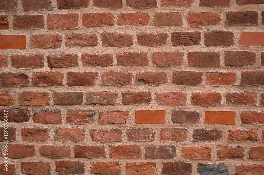 Fototapeta premium Red brick wall texture Vintage brick wall background Brick masonry surface Rustic brickwork patternOld red bricks close-up