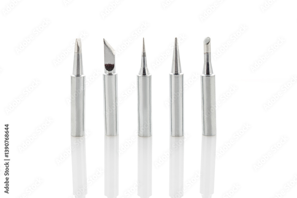 Set of soldering iron tips isolated on a white background, close-up. Set of soldering iron tips isolated on a white background, close-up.