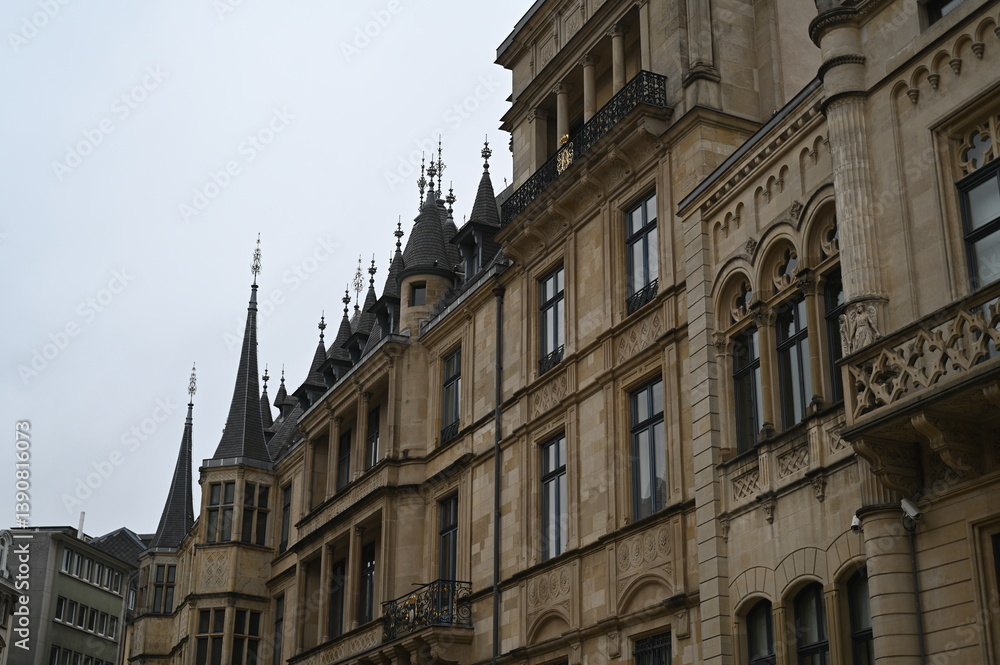 Fototapeta premium Grand Ducal Palace in Luxembourg City, historic architecture with tower and ornate stone facade. Famous European landmark and travel destination.