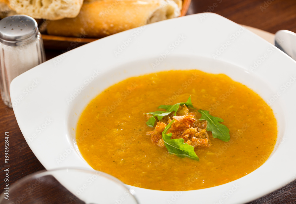 Dietary cream soup of vegetables garnished with caramelized onion and fresh arugula .. Dietary cream soup of vegetables garnished with caramelized onion and fresh arugula ..