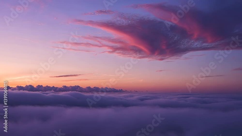 Splendid twilight. Evening sky at sunset showcasing vivid sunlight. Soft shades. Nature's abstract backdrop. Striking clouds in the sunset sky captured with long exposure.