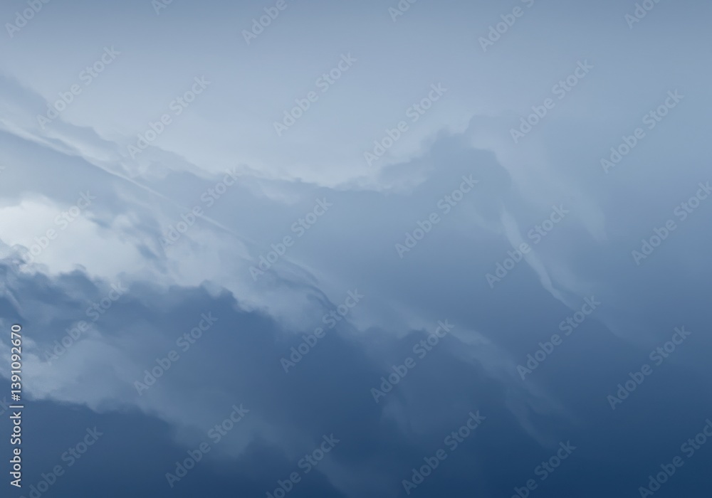 Obraz premium Abstract blue and white cloudy sky background with soft gradient and blurred cloud formations