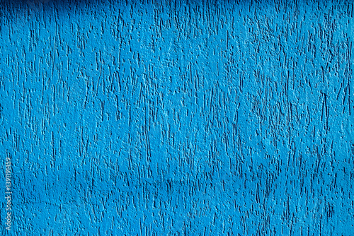 Obraz na płótnie Vibrant blue wall texture with rustic finish. Close-up showing details of the coating, ideal for architecture and design concepts w salonie