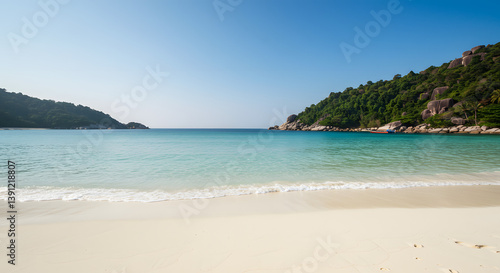 Idyllic Tropical Beach with Turquoise Water and Lush Green Hills