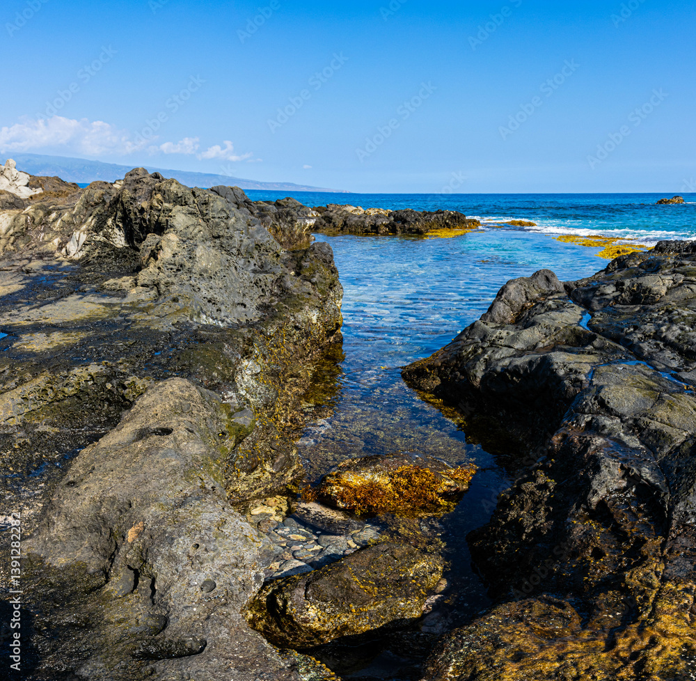 Tide Pools on The Volcanic Shoreline Below The Ironwood Cliffs, Kapalua Coastal trail, Kapalua, Maui, Hawaii, USA Tide Pools on The Volcanic Shoreline Below The Ironwood Cliffs, Kapalua Coastal trail, Kapalua, Maui, Hawaii, USA