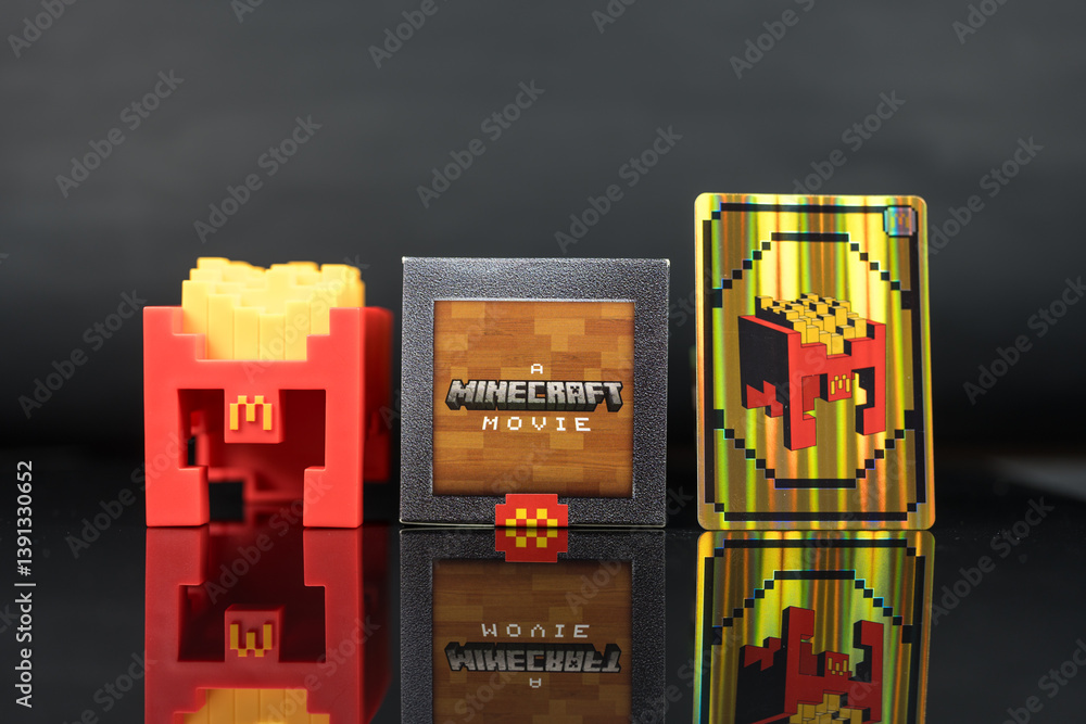 Fototapeta premium Bangkok, Thailand - April 8, 2025 : Fry Helmet Minecraft from McDonald, Toy form Minecraft blind box from McDonald's collaborates Minecraft the movice
