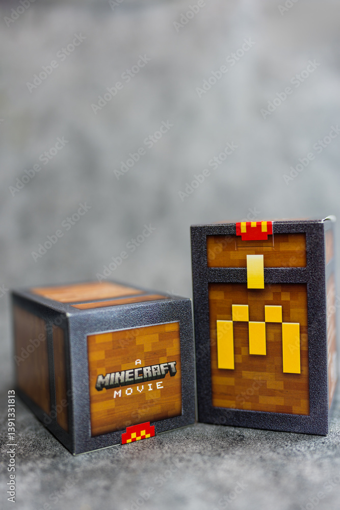 Fototapeta premium Bangkok, Thailand - April 8, 2025 : Box form McDonald’s Minecraft collectibles. Minecraft toy random box.