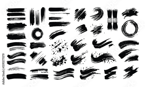 A collection of black brush strokes in various shapes and textures on a white background, perfect for digital design and artistic projects.