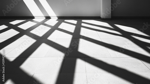 Obraz na płótnie Black and white shadow patterns on tiled floor from window light in abstract minimal setting w salonie