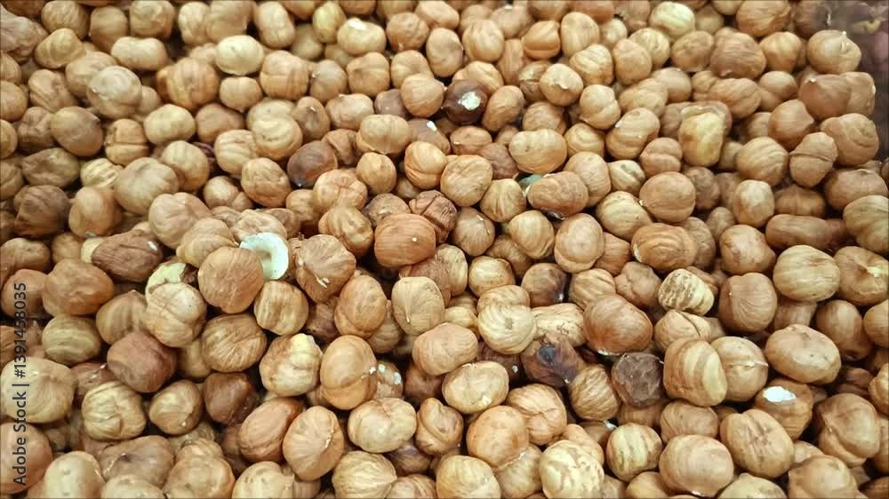 A bunch of hazelnuts. The benefits of hazelnuts. Nuts have a high protein and fat content. A bunch of hazelnuts. The benefits of hazelnuts. Nuts have a high protein and fat content.