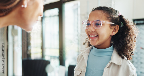 Photos Happy girl, glasses and optometry with lens for eyecare, sight or vision aid at optometrist
