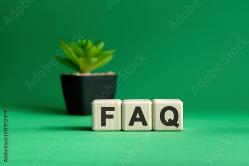 Fag on wooden cubes text on a green background