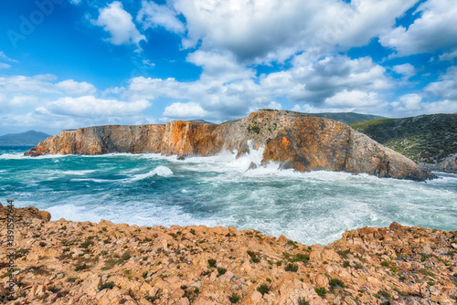Obraz na płótnie Attractive view of cliffs in valley Cala Domestica and storm on the sea w salonie