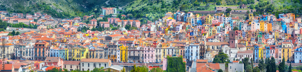 Obraz premium Unbelivable morning panorama of colourful houses of old town Bosa in Sardinia.