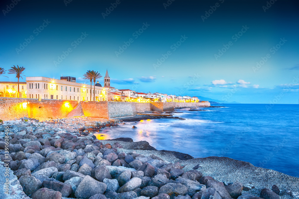 Astonishing evening cityscape of historical part of Alghero town.