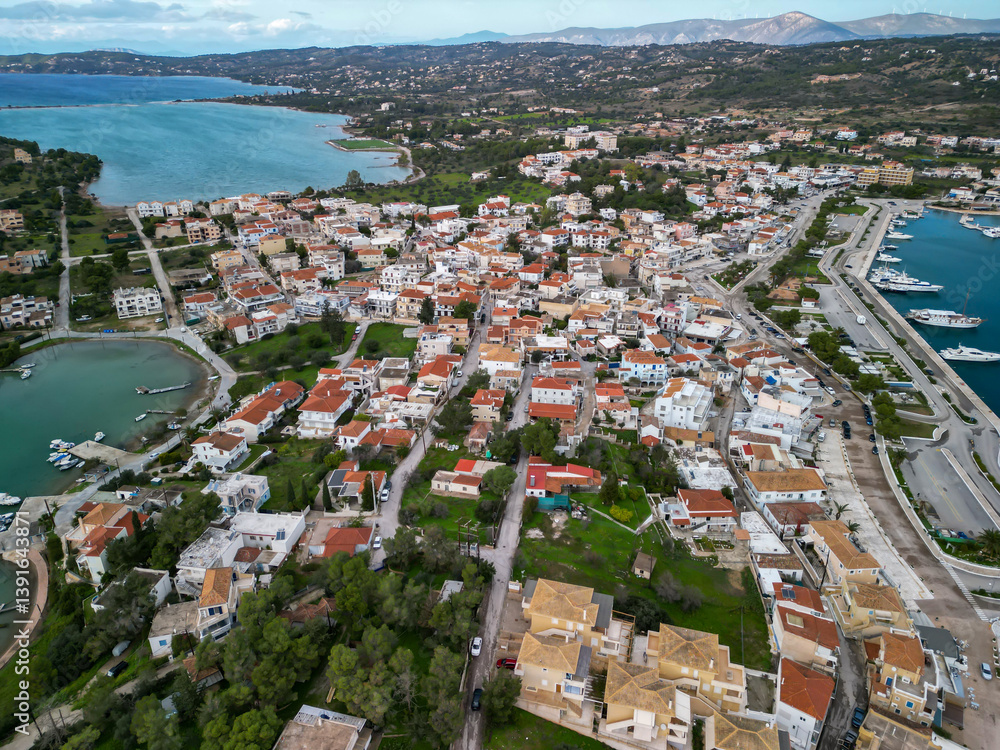 Fototapeta premium Aerial View of Coastal Town and Marina in the Peloponnese, Greece
