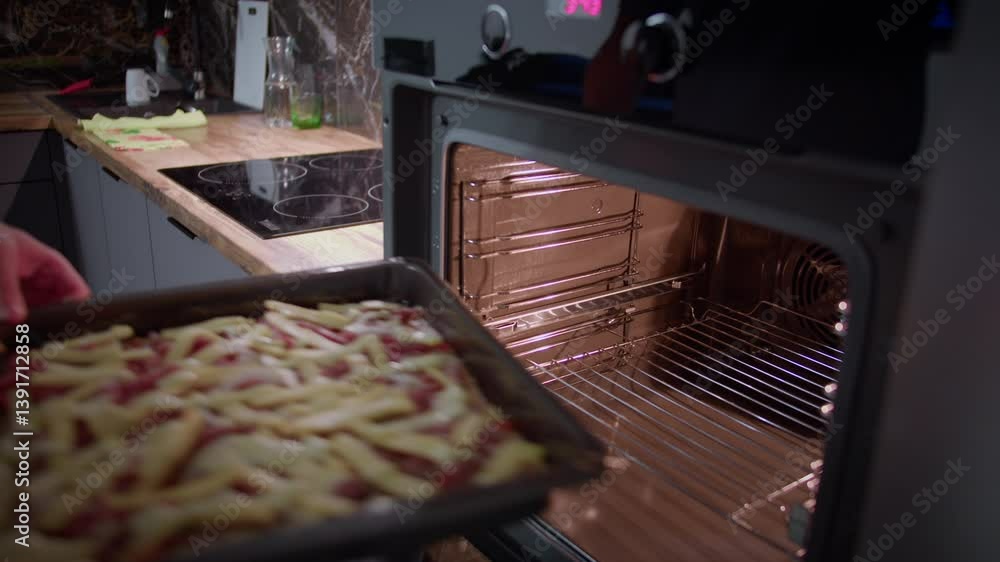 custom made wallpaper toronto digitalMan making homemade pizza in his kitchen, putting a baking tray in the oven, cooking at home, camera tracking