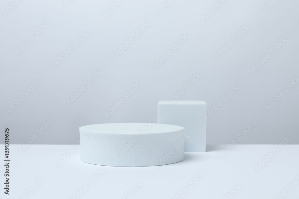 White podiums on a light background White podiums on a light background