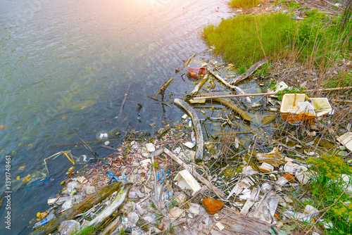 Fotografie Garbage dumping at mouth river