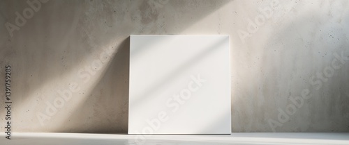 Obraz na płótnie blank white square canvas on a textured gray wall mockup. w salonie