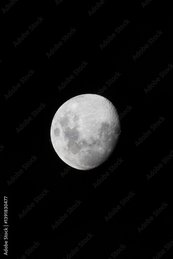 High-definition image of the waxing gibbous moon captured against a black sky. A minimalist and striking view of Earth’s natural satellite, ideal for scientific use, education, editorial projects... High-definition image of the waxing gibbous moon captured against a black sky. A minimalist and striking view of Earth’s natural satellite, ideal for scientific use, education, editorial projects...