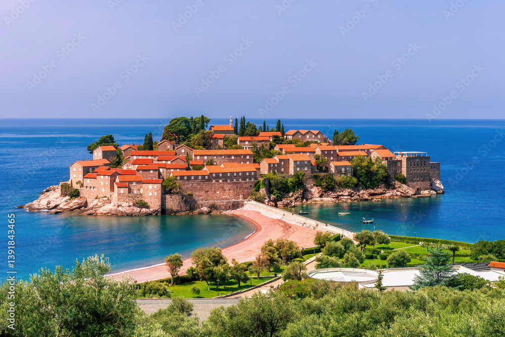 beautiful summer landscape of amazing resort on amazing island with yellow ancient walls and orange tile roofs among sea vawes and nice blue sky on background beautiful summer landscape of amazing resort on amazing island with yellow ancient walls and orange tile roofs among sea vawes and nice blue sky on background