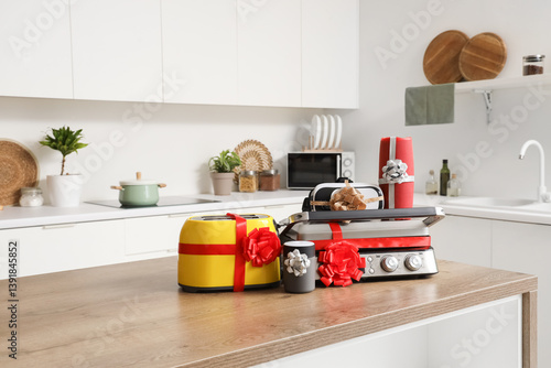 Obraz na płótnie Different household appliances on counter as gift in kitchen w salonie