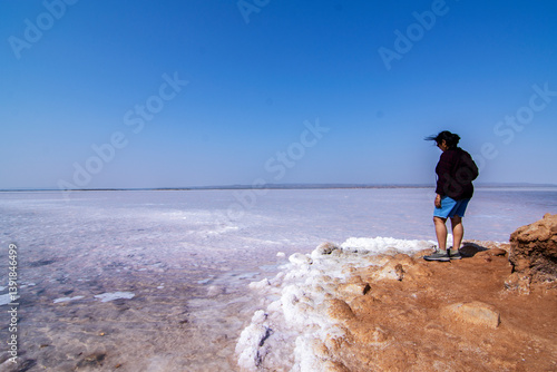 Obraz na płótnie Solo Female Traveler Enjoying Raw Nature on Road to Heaven in White Desert of Rann of Kutch w salonie