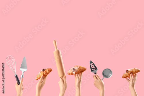 Obraz na płótnie Female hands with different baking utensils and tasty croissants on pink background w salonie