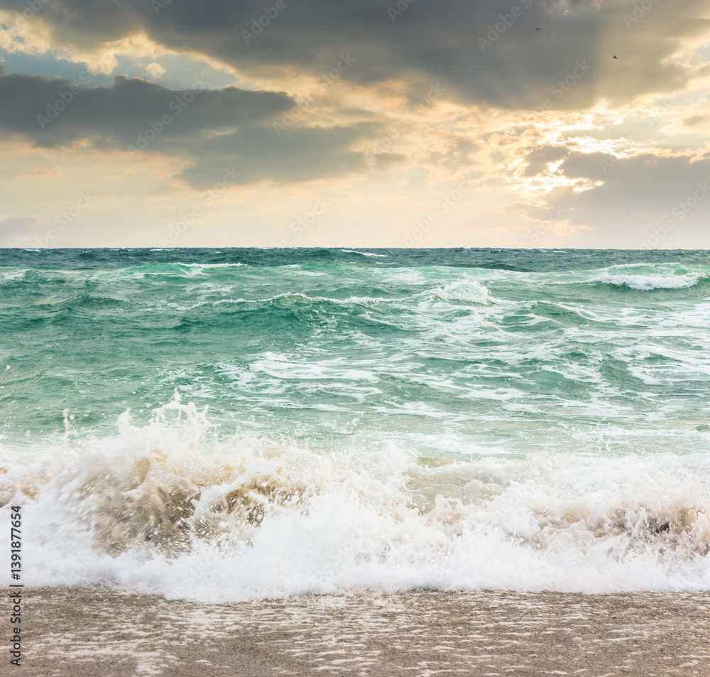 seascape in morning light. bad vacation season background. stormy weather with cloudy sky in summer. sea wave crashing on the shore. europe extreme meteorology forecast