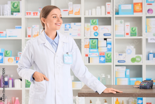 Smiling female pharmacist i...
