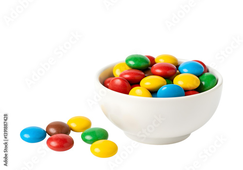 Colorful candies in bowl isolated on white background