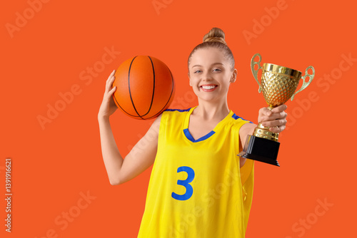 Sporty young woman with bas...
