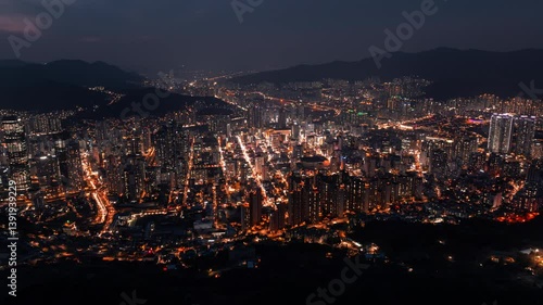 Aerial hyperlapse view of Seomyeon district at night in Busan, South Korea