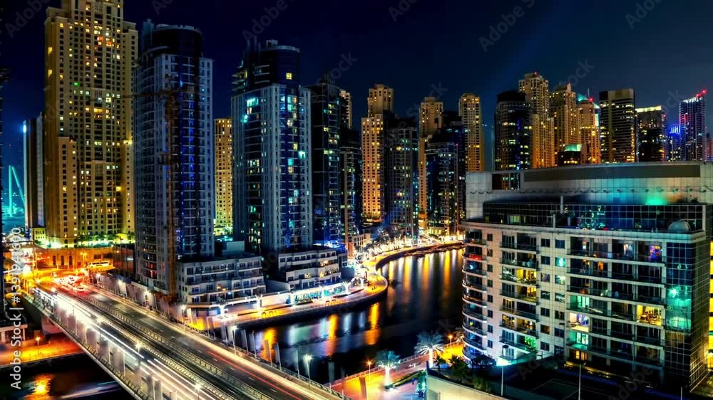 Panoramic skyline of the buildings night timelapse in Dubai, UAE. Panoramic skyline of the buildings night timelapse in Dubai, UAE.