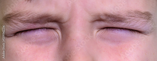 boy with closed eyes. close-up part of face