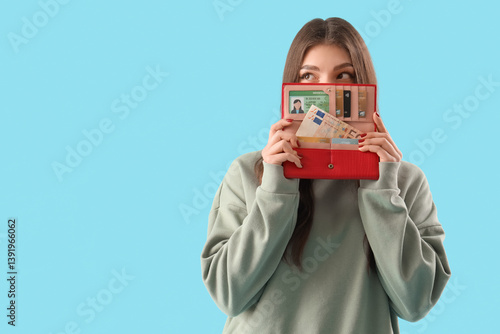 Young woman with purse and ...