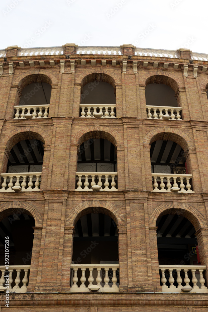 Obraz premium Valencia bullring Plaza de Toros in Xativa street of Spain. Concept of travel, tourism and vacation in city. High quality photo