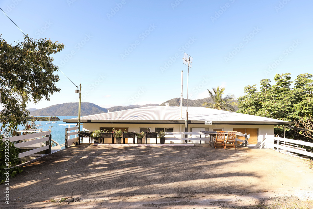 Apartment building on cliff edge with view of Shute Harbour in the Whitsundays Apartment building on cliff edge with view of Shute Harbour in the Whitsundays