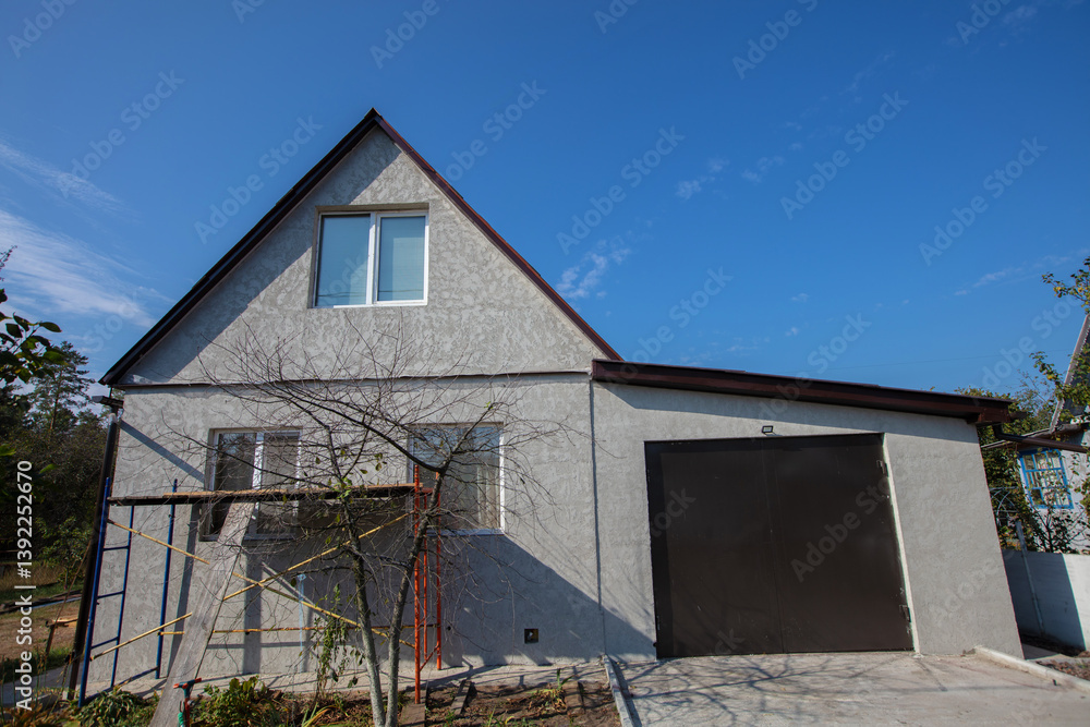 Small country house with a plot. Typical houses given in the post-Soviet space. Small country house with a plot. Typical houses given in the post-Soviet space.