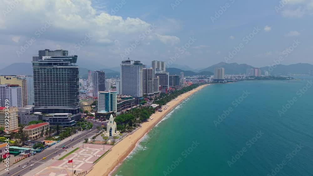 Aerial panorama of nha trang coastline with skyscrapers and beachfront activity, Vietnam. Aerial panorama of nha trang coastline with skyscrapers and beachfront activity, Vietnam.