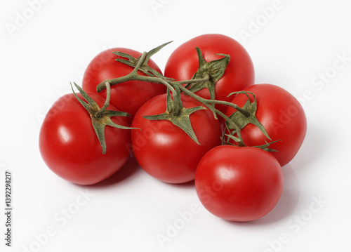 Cherry tomatoes on a white background