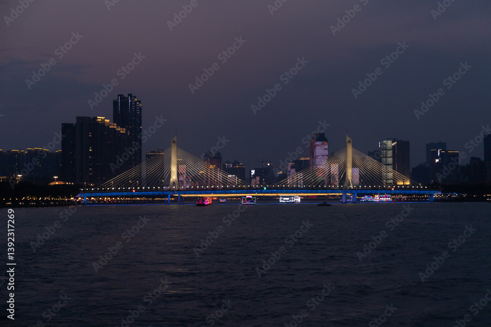 Fototapeta premium Haiyin Bridge over the Pearl River in Guangzhou, Guangdong, China at dusk