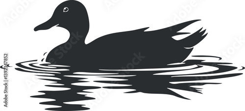 Silhouette of a duck swimming on calm water with ripples and reflection.