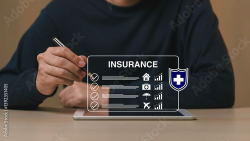Obraz na płótnie Man using stylus with digital insurance checklist on tablet, representing health, property, travel, and life coverage planning through modern digital platforms. w salonie