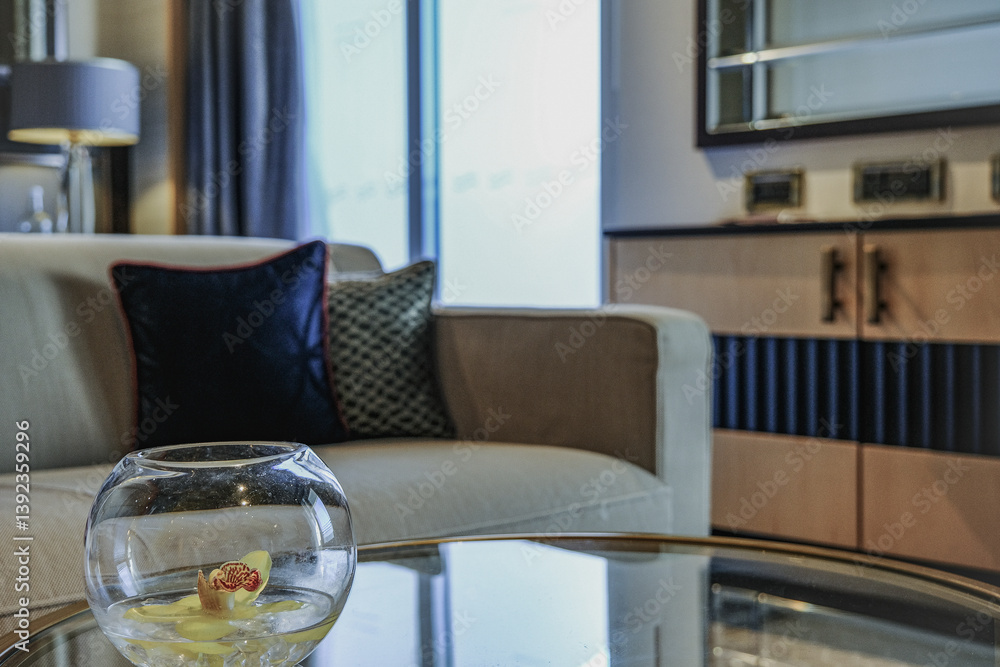 Luxurious ocean view or oceanview or outside balcony veranda cabin stateroom suite queen king double bed on luxury ocean liner cruiseship cruise ship in classic classy interior Art Deco style design
