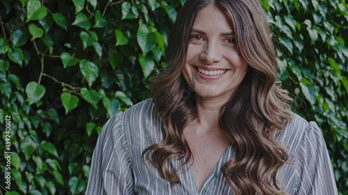 The Smiling Woman Among Greenery