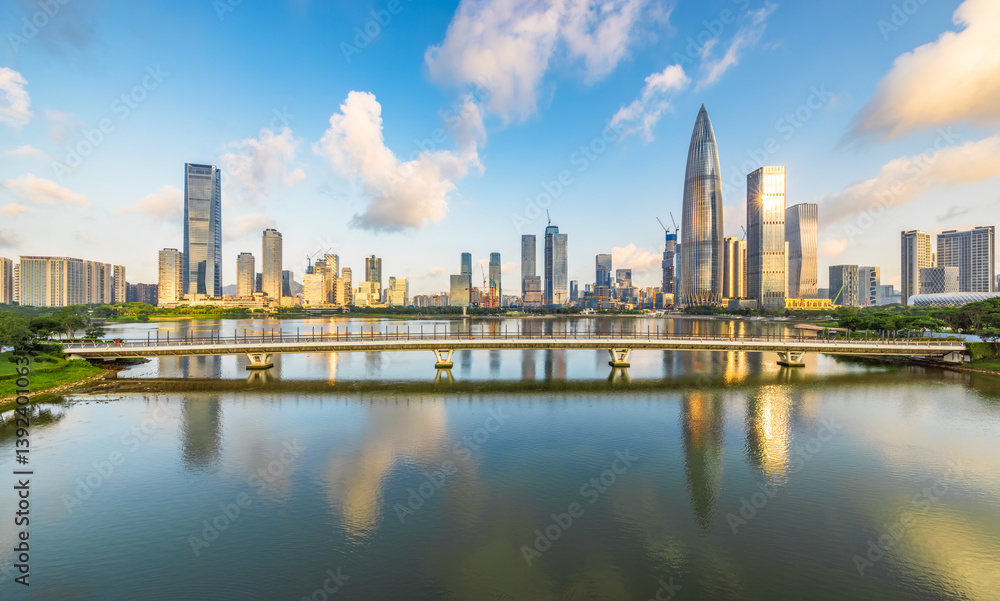 Shenzhen cityscape skyline with building reflection in water during clear day. Business background. Shenzhen cityscape skyline with building reflection in water during clear day. Business background.